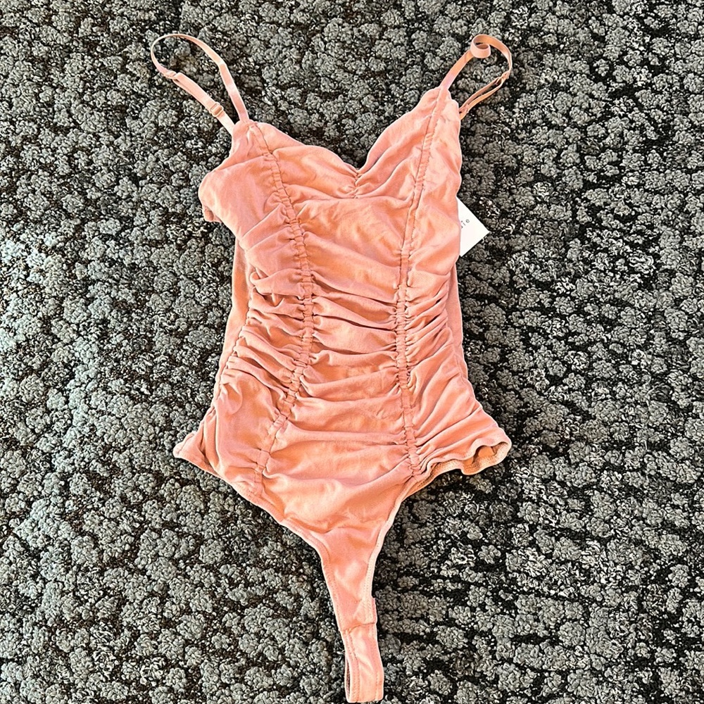 Never been worn pink bodysuit
